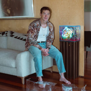 Ben Weyerhauser with his art collection at home
