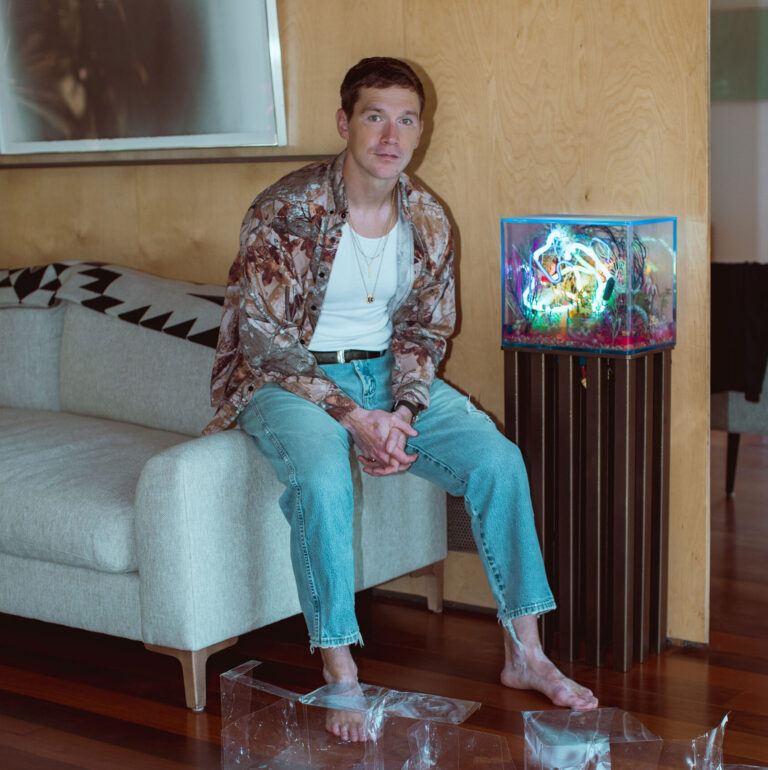 Ben Weyerhauser with his art collection at home