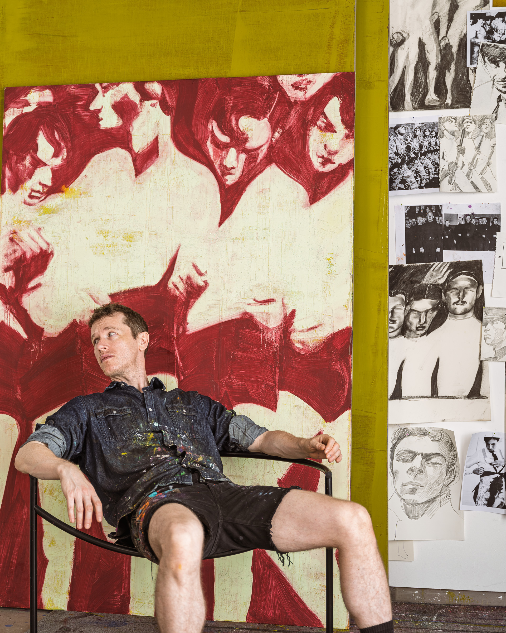 Alex Foxton in his studio with paintings from a Salon 94 exhibition