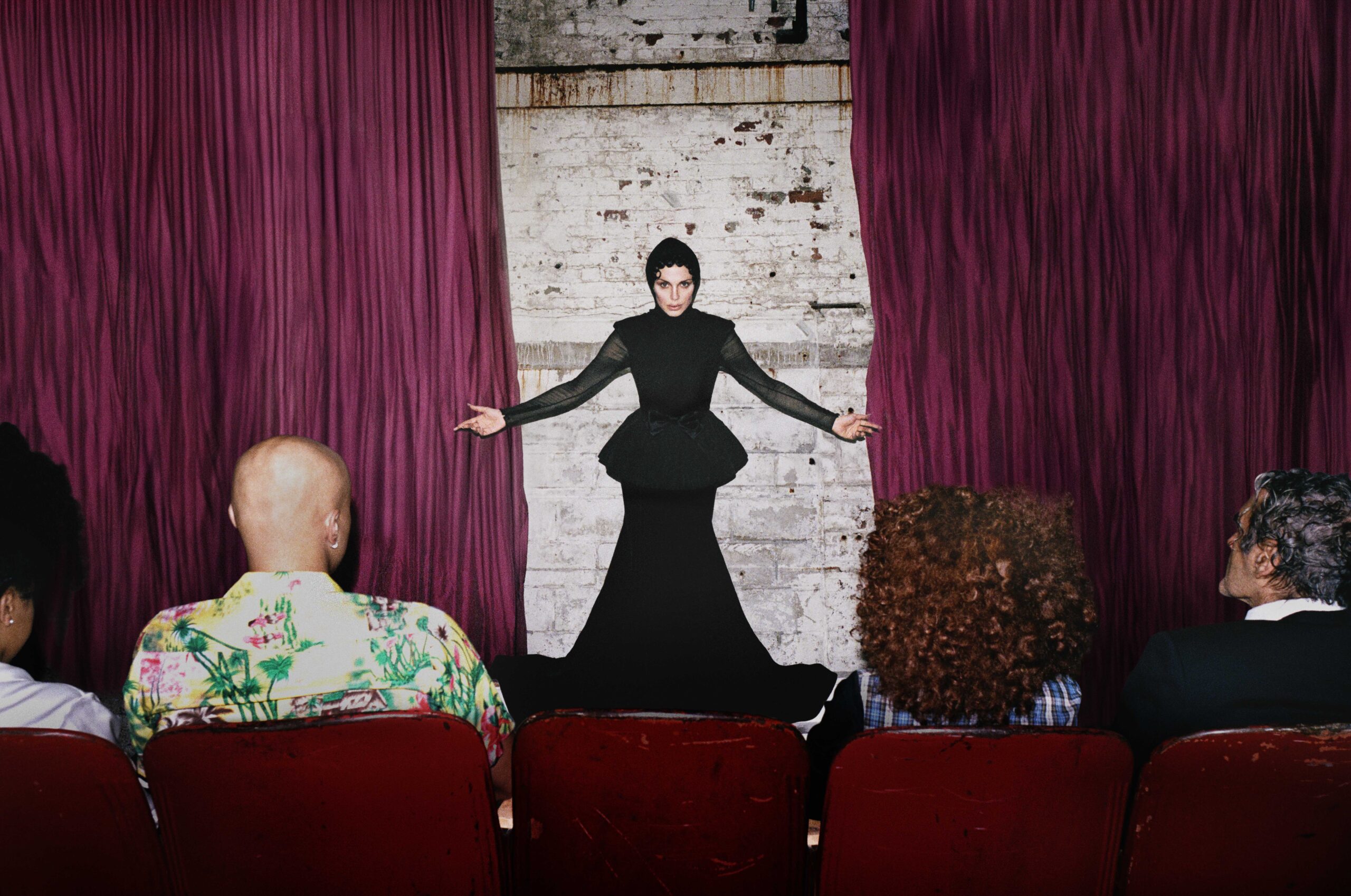 Julia Fox wears a full look by Valentino.