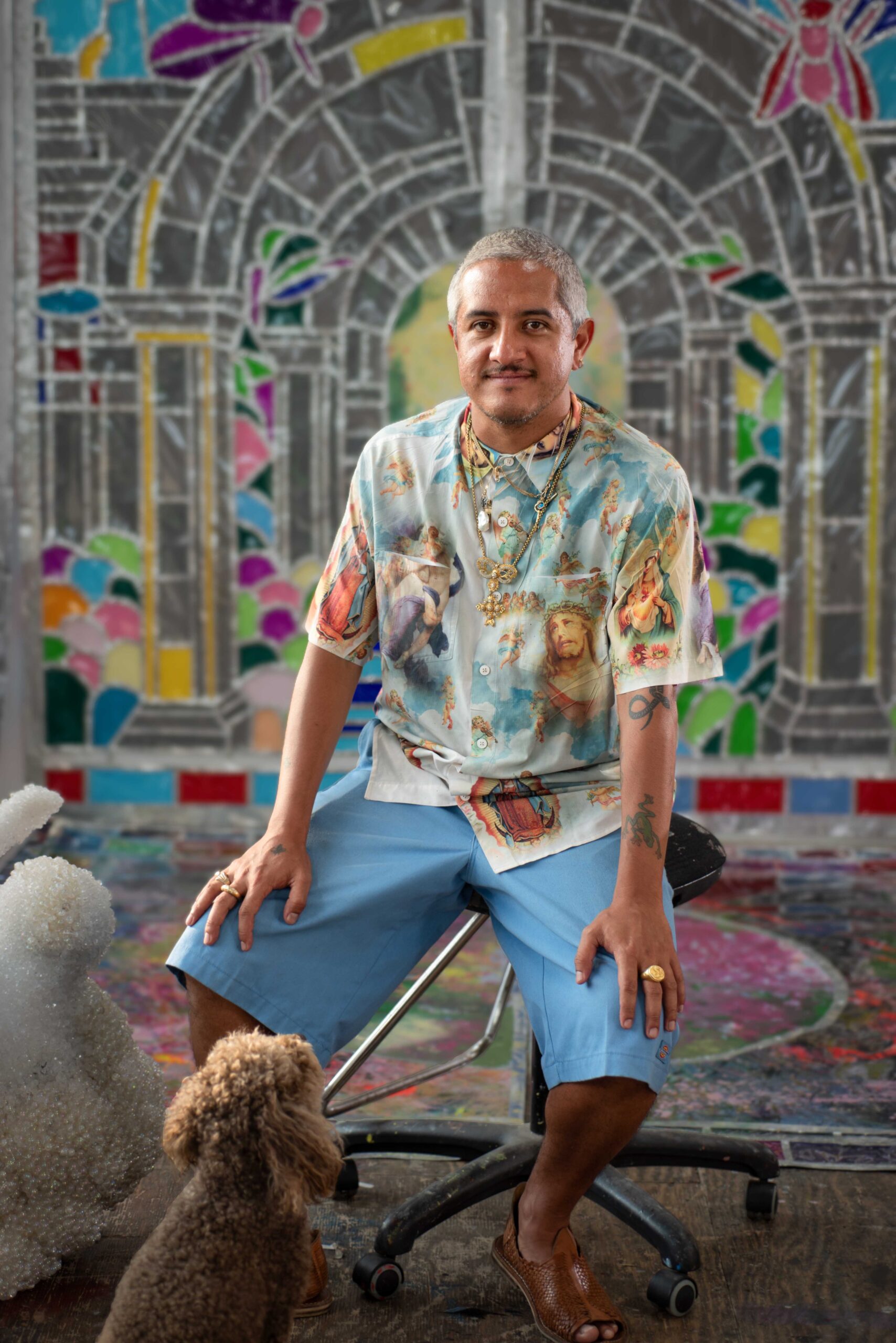 Raúl de Nieves in his Williamsburg studio with his dog, Penguini.