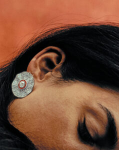 Round and Baguette Ruby with White Round Diamond Earrings set in white gold.