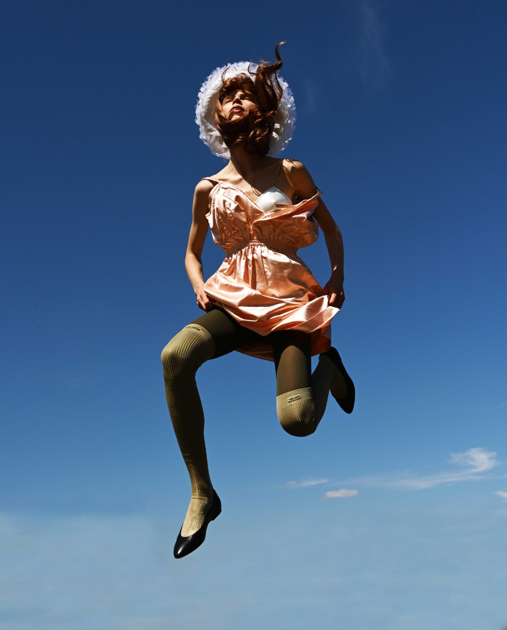Anneliek, dress, bra, socks. Miu Miu, tights, Tabio, hat, Noel Stewart