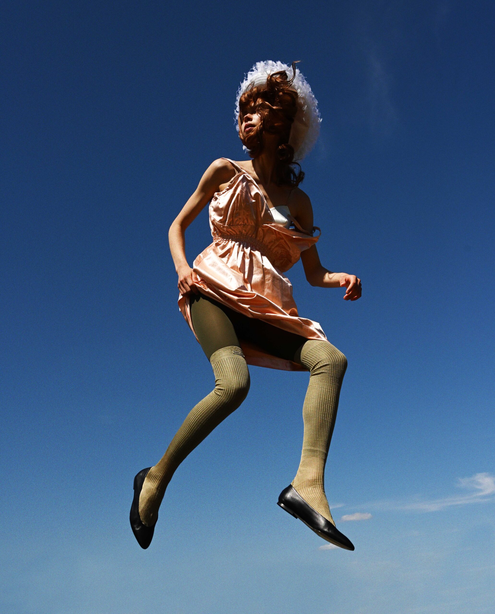 Anneliek, dress, bra, socks. Miu Miu, tights, Tabio, hat, Noel Stewart