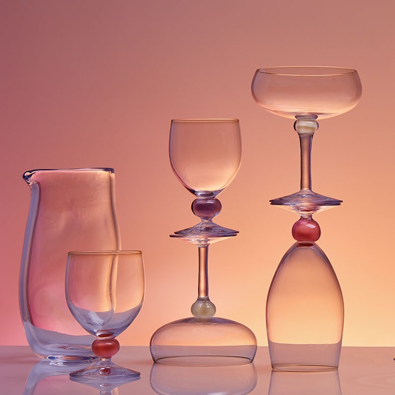 Helle Mardhl, earthy tones, glassware, champagne glass, coconut, water glass, wine glass, pitcher, plum, skinny vase, serving dish