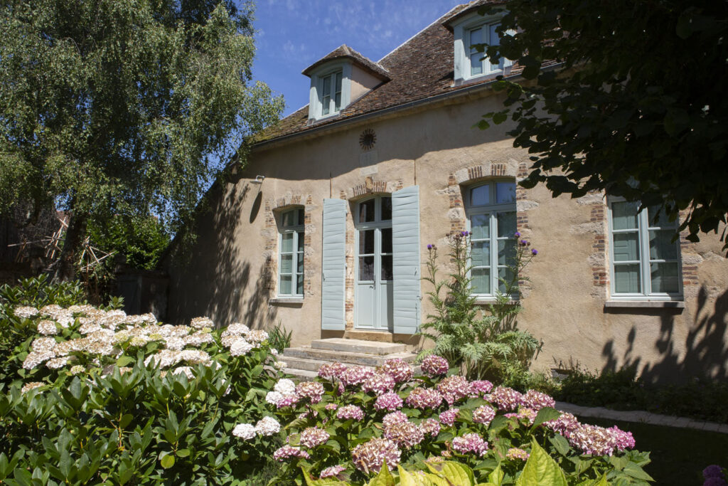 Buffévent's hydrangea-drenched country escape was originally clergy housing built in 1748 and revamped in 1841.