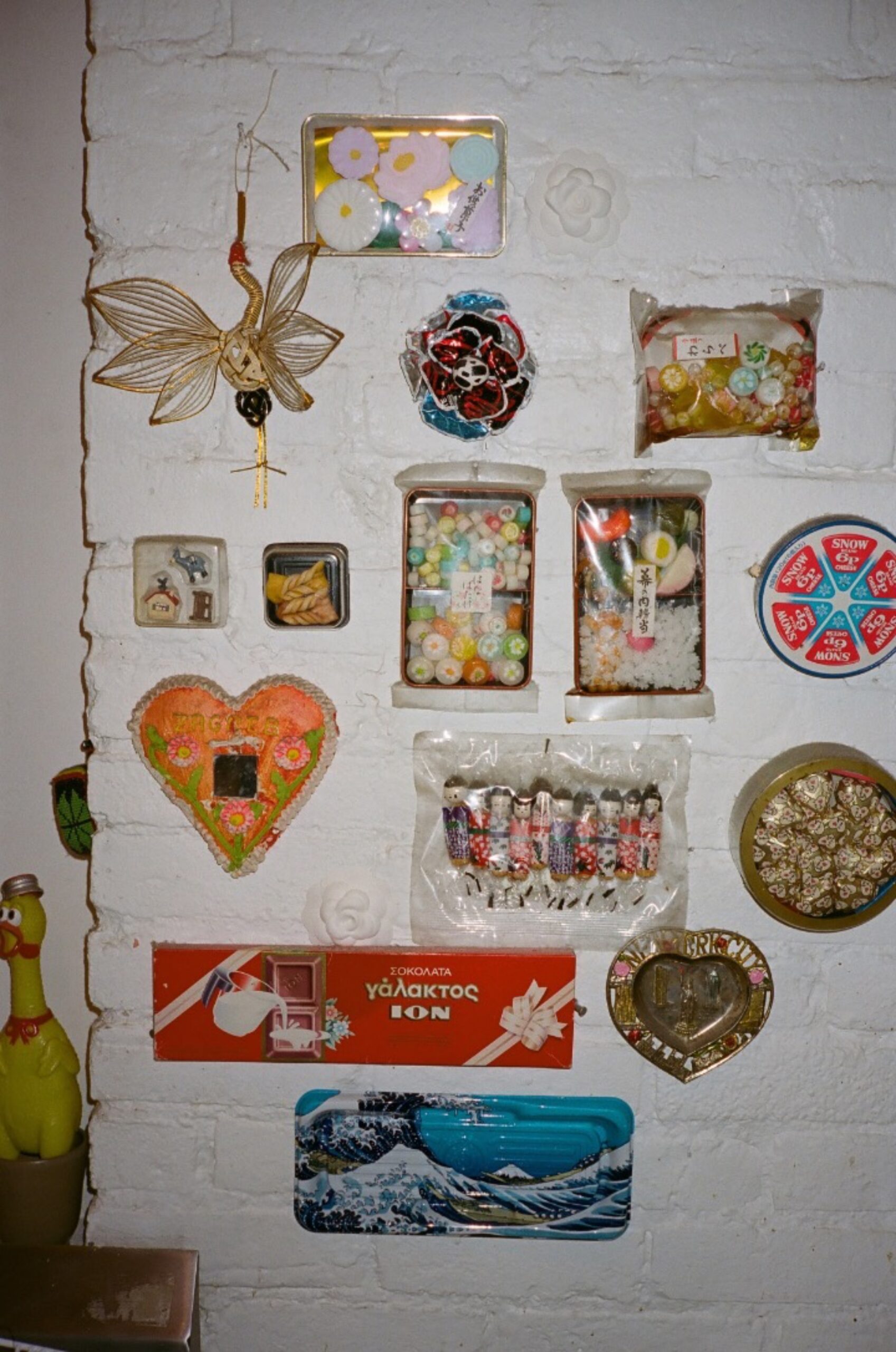 That's my sugar wall. A lot of Japanese candy. Some of these were made especially for tea ceremonies. It's just pure sugar. One of them, I think, was brought back from Eastern Europe for me. First there was one, then there were two, then three, and then it became a wall.
