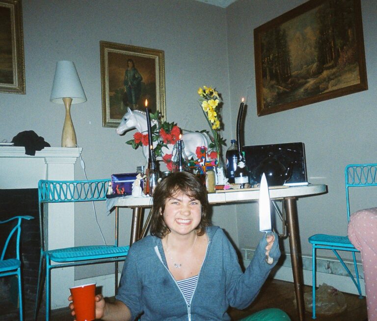 girl sitting in front of table