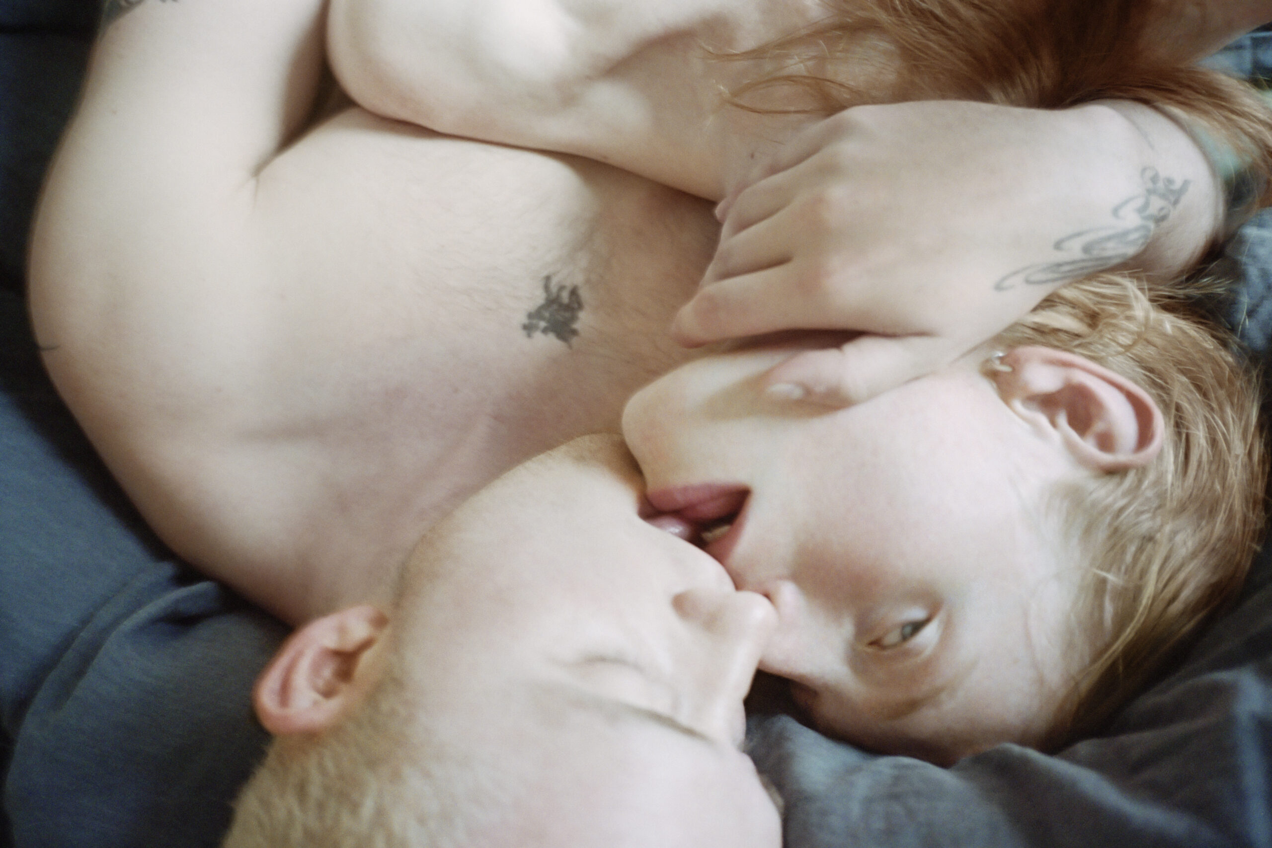Photo by Sam Penn, Bed Kiss, 2025. 