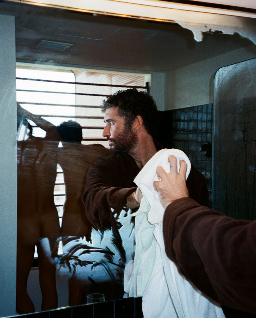 Jordan Firstman wears a robe by Tom Ford.