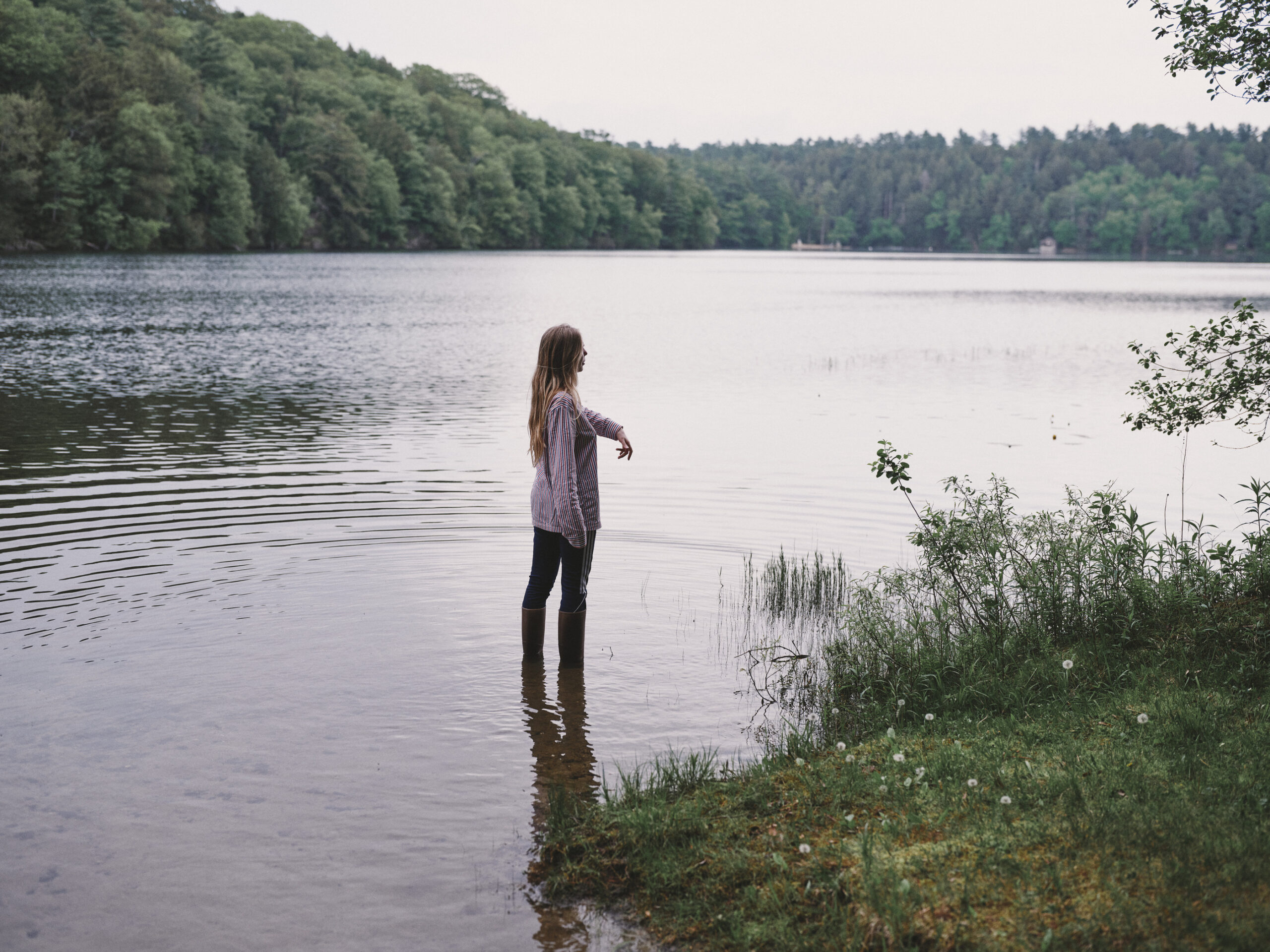 Women standing in lake