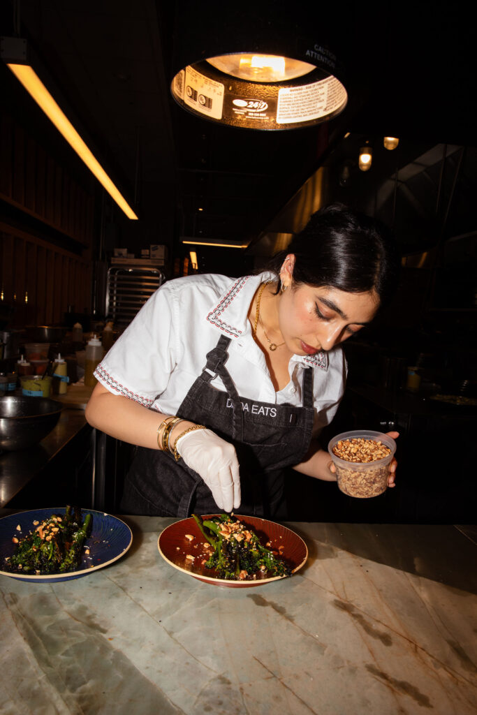 Samah Dada cooking at a restaurant