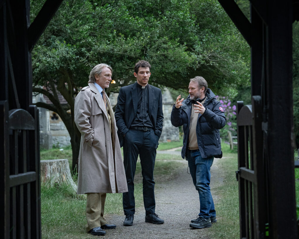 Rian Johnson directs actors Daniel Craig and Josh O'Connor on the set of Wake Up Dead Man: A Knives Out Mystery.