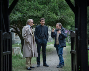 Rian Johnson directs actors Daniel Craig and Josh O'Connor on the set of Wake Up Dead Man: A Knives Out Mystery.