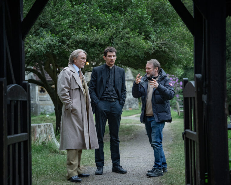 Rian Johnson directs actors Daniel Craig and Josh O'Connor on the set of Wake Up Dead Man: A Knives Out Mystery.