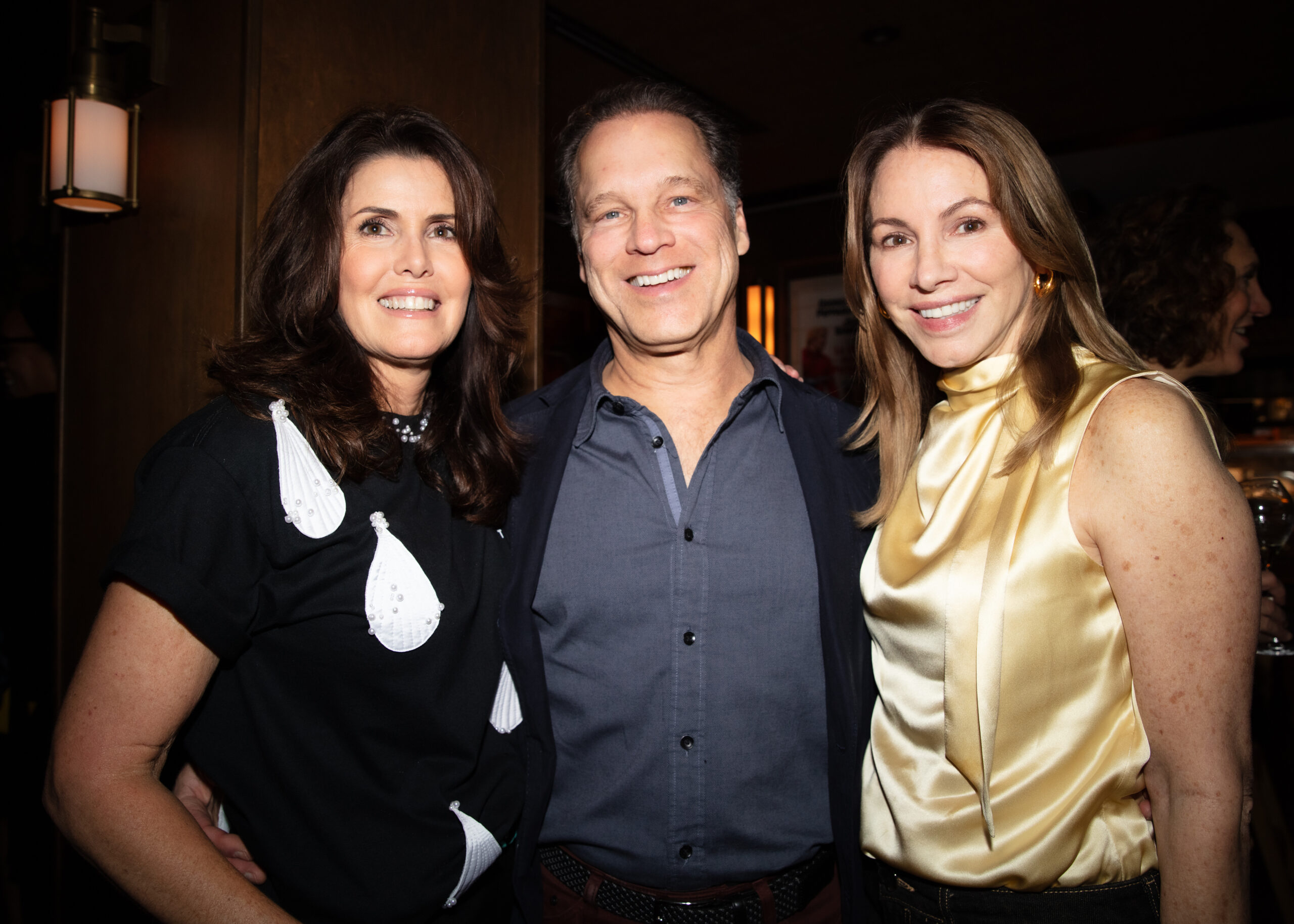 Darlene Pérez, Ernesto Poma, and Cecilia Poma pose for a photo