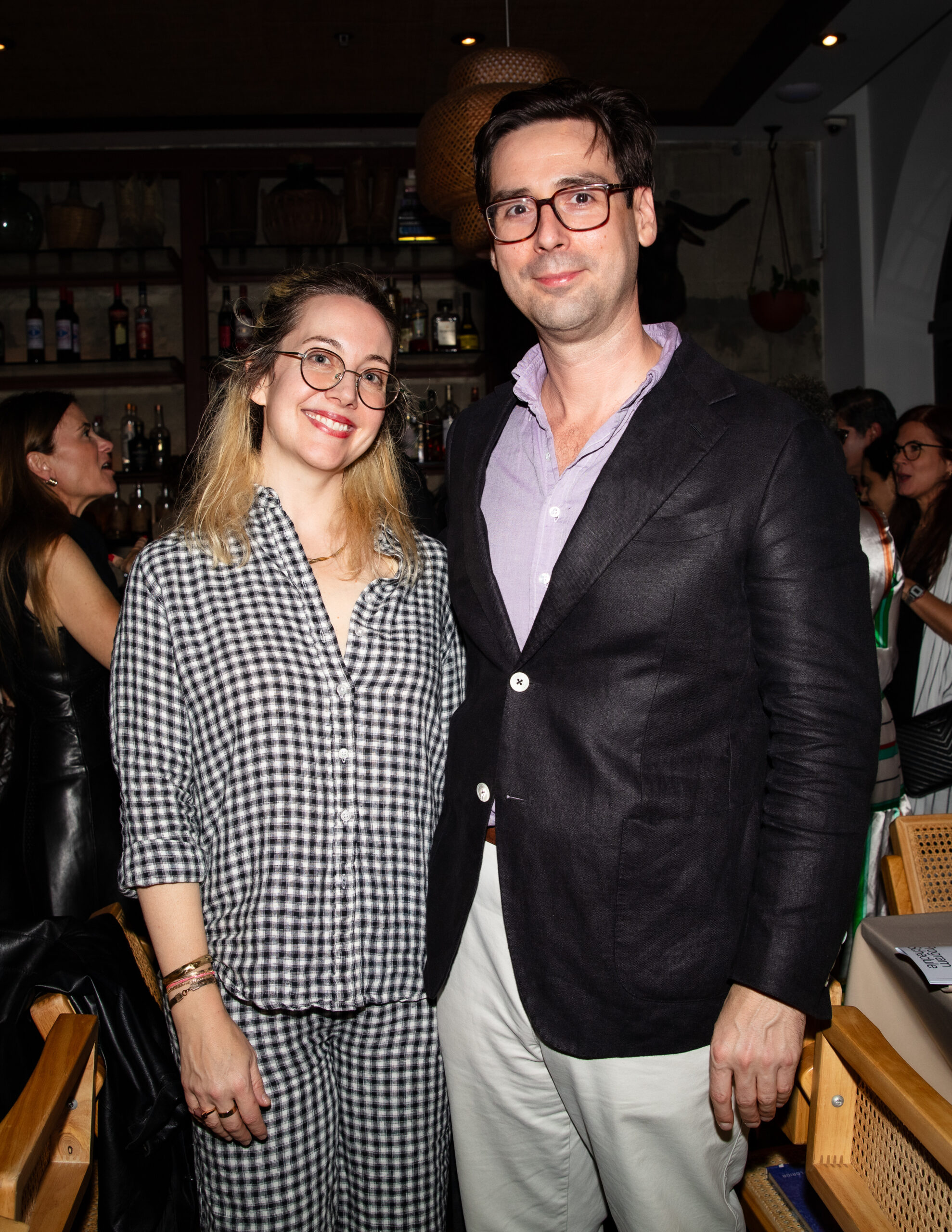 Margaux Ogden and Hunter Braithwaite pose for a photo at Miami Art Week