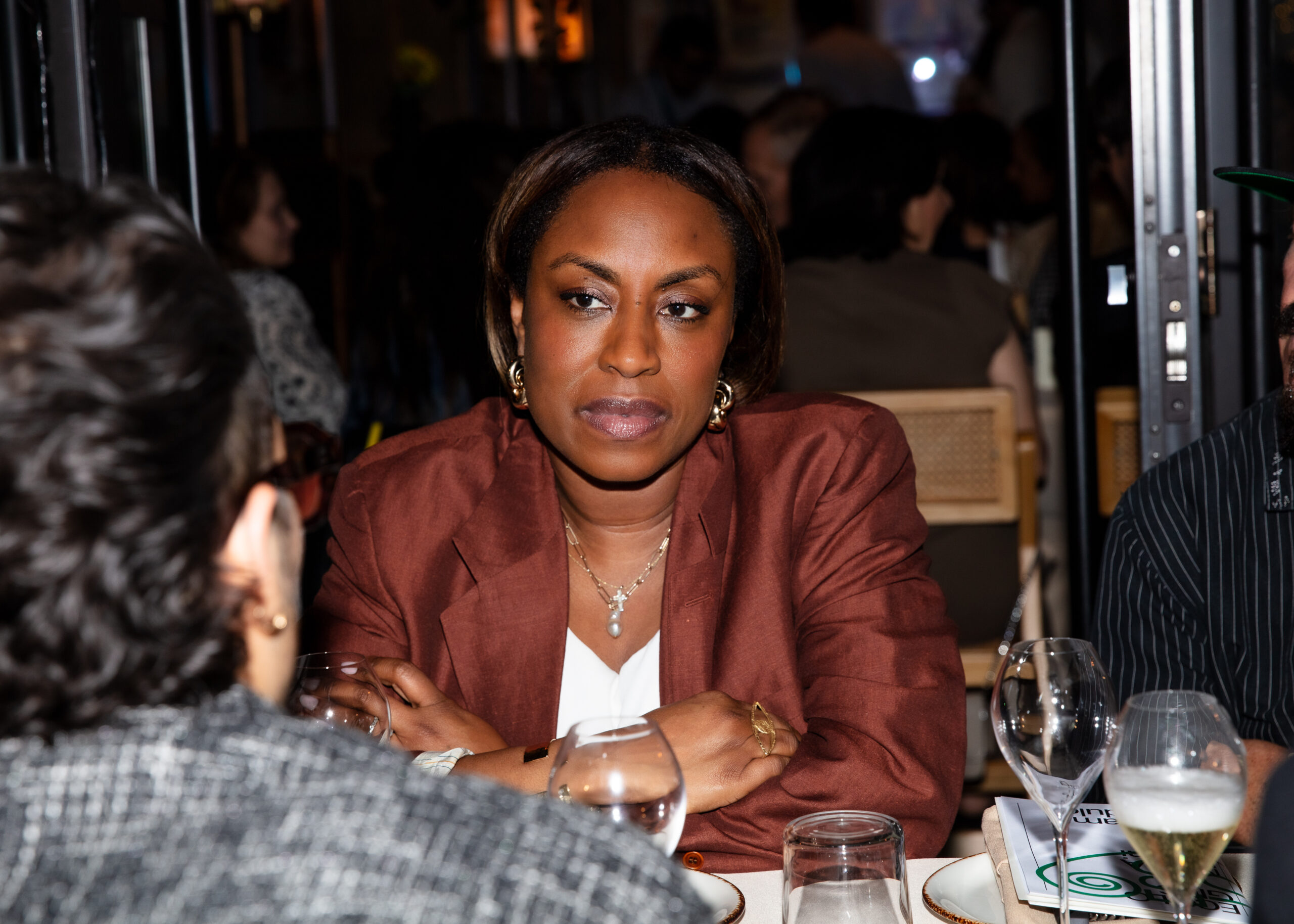 Tiana Webb-Evans sits at a dinner table