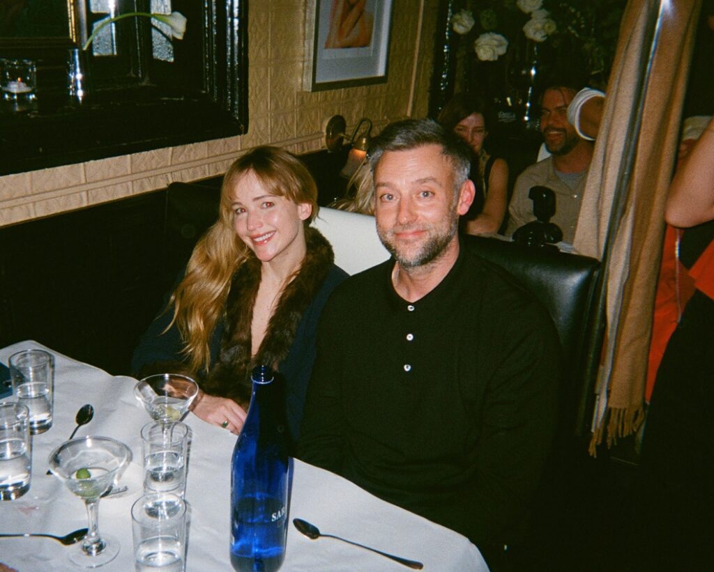 Jennifer Lawrence and Cooke Maroney in their booth