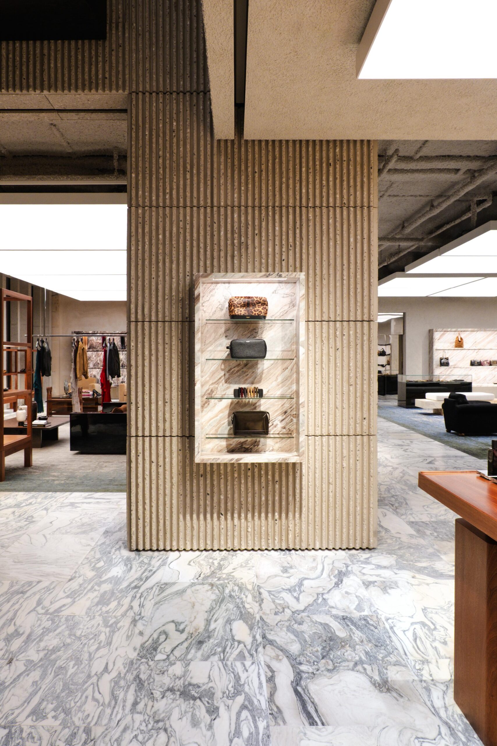 Saint Laurent store, bags and wallets on wall