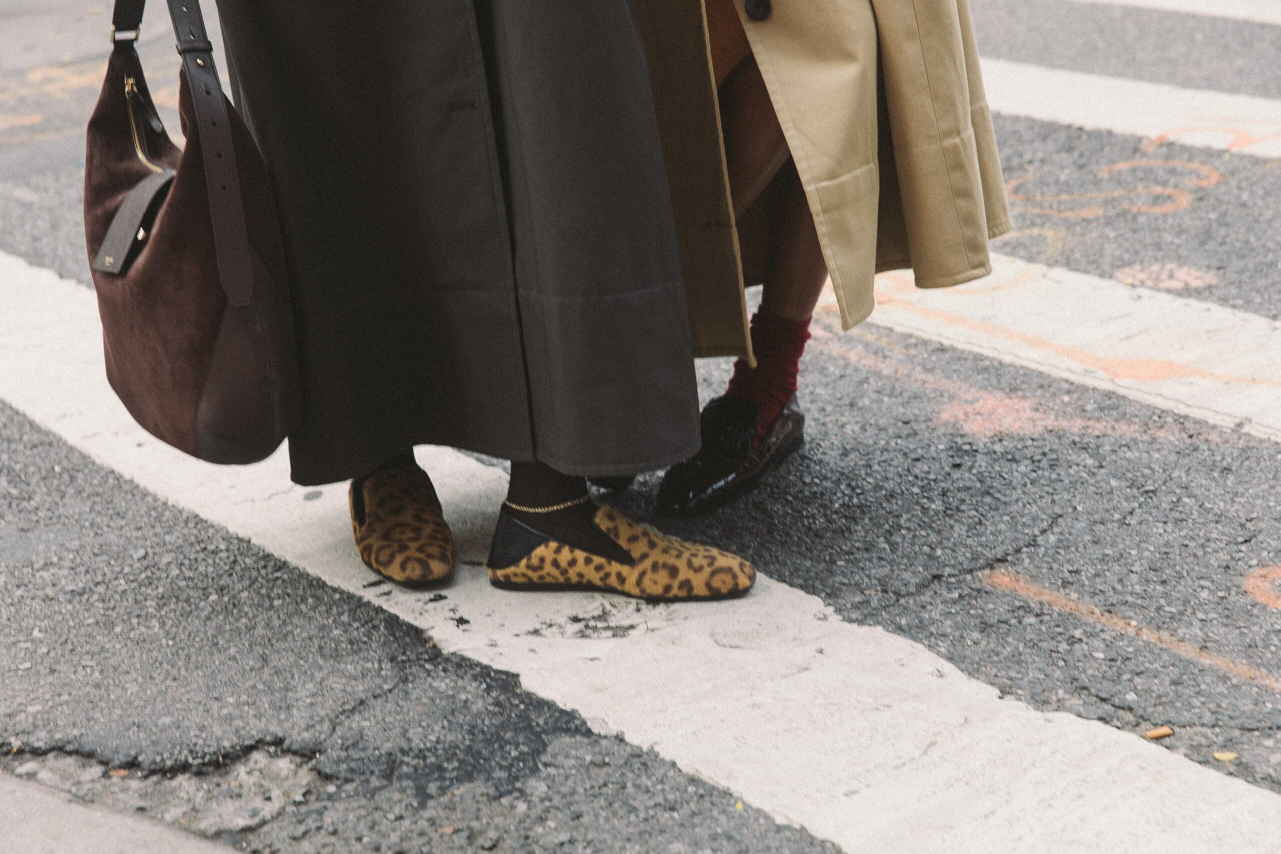 Kilo and Morgan wear Eliot Slippers and a Bar Hobo by Jimmy Cho