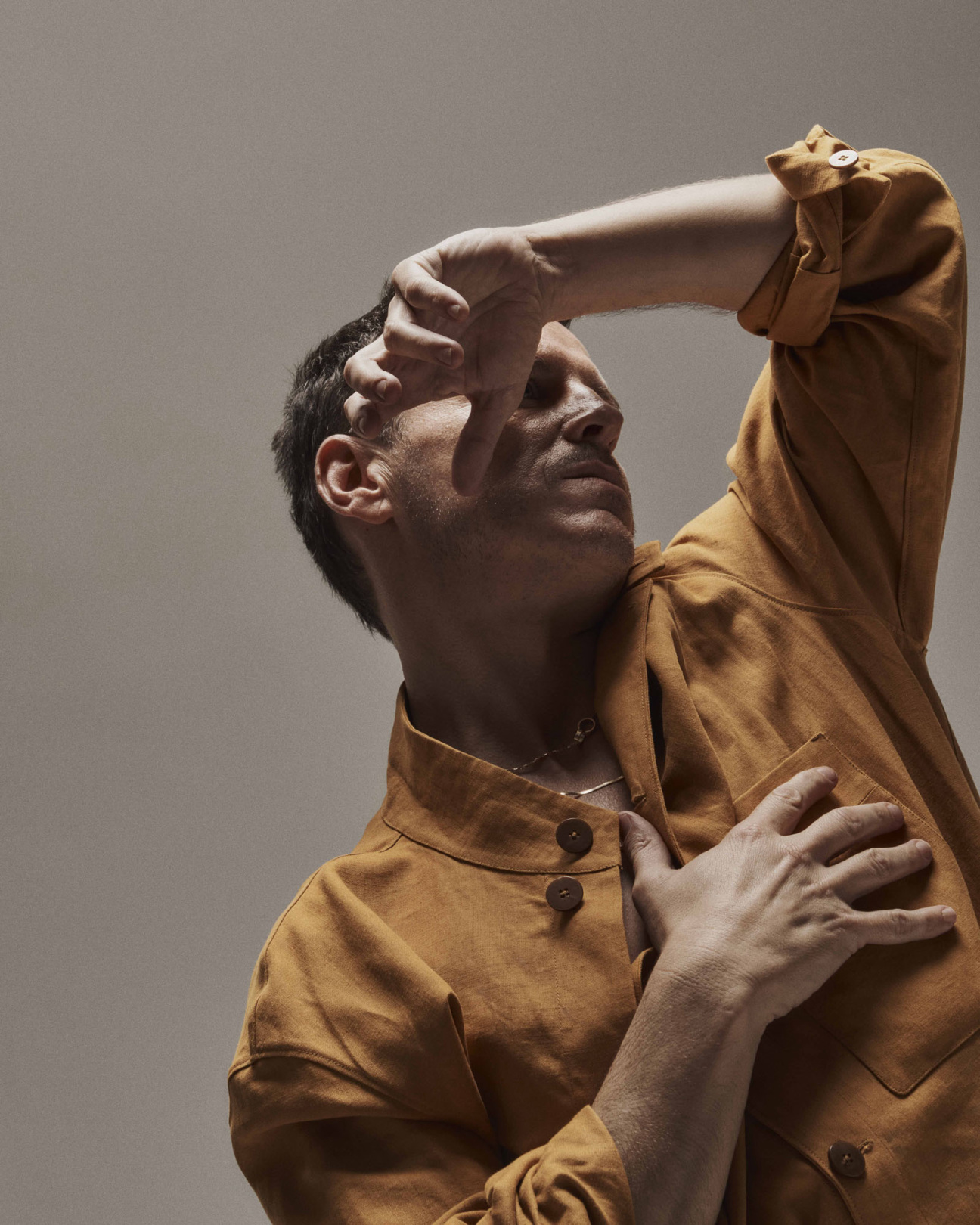 Andrew Scott wears a top by Zegna and necklace by Cartier.