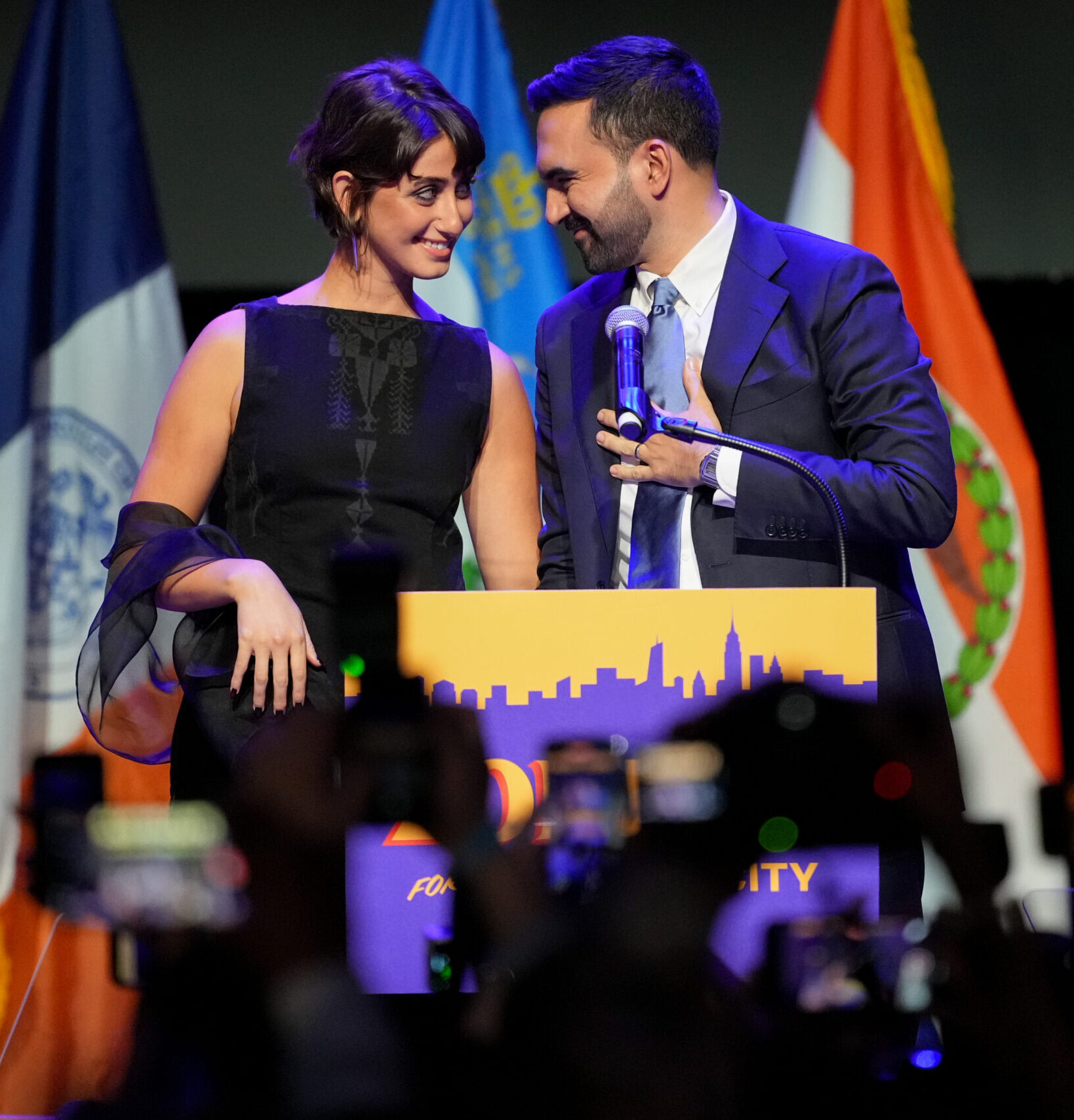 Mayor-Elect Zohran Mamdana and artist Rama Duwanji on election night, photography by Adam Gray/Bloomberg, and courtesy of Getty Images