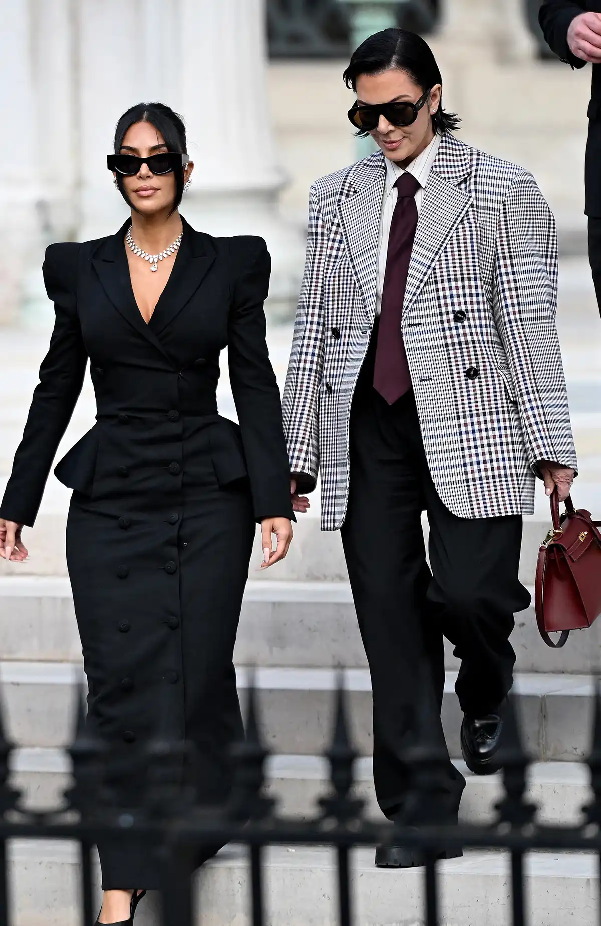 Kim Kardashian and Kris Jenner on their way to court in Paris, photography by Thomas Samson/AFP, and courtesy of Getty Images