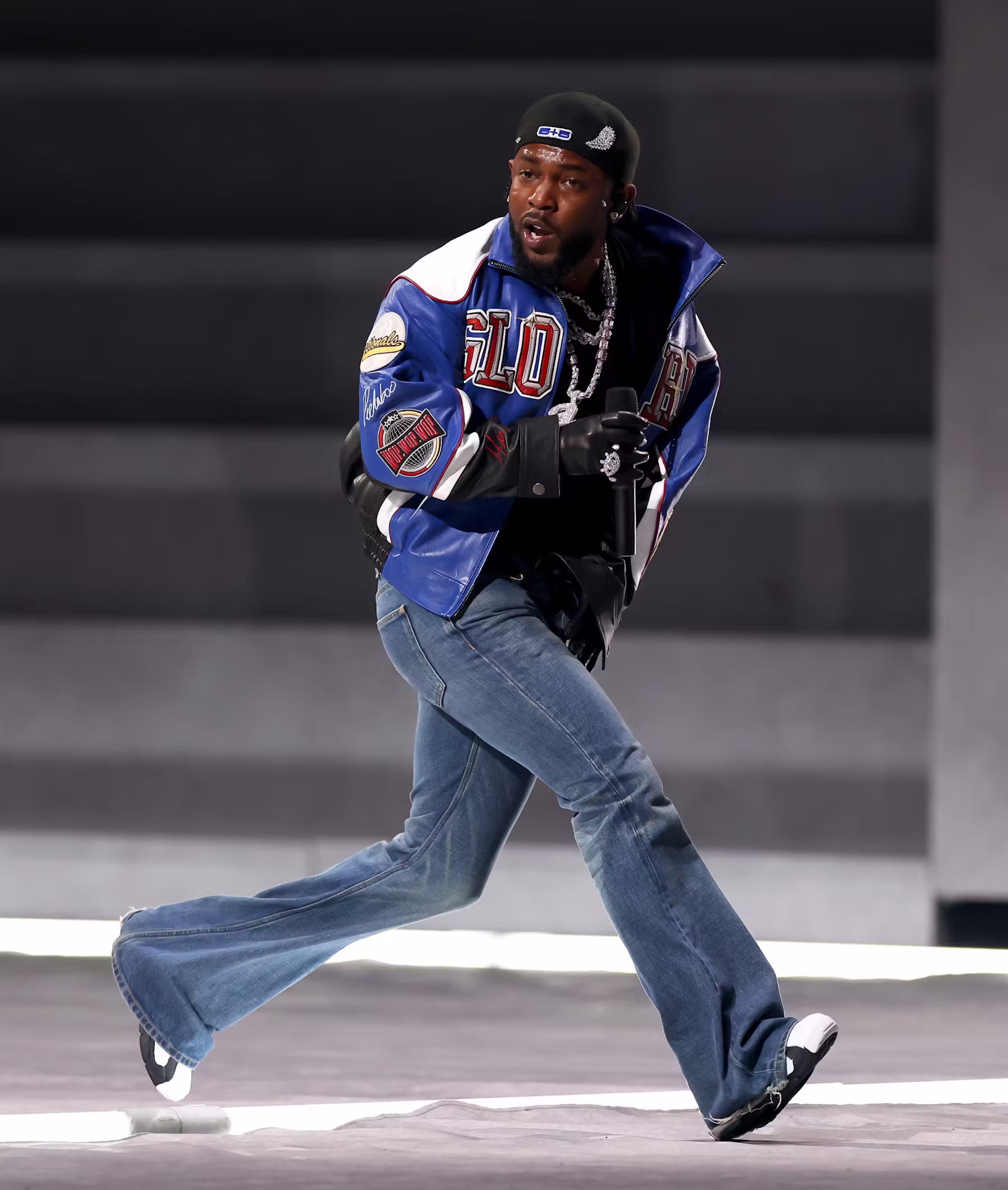 Kendrick Lamar performs in the Super Bowl halftime show in Martine Rose and Celine. Image courtesy of Getty Images.