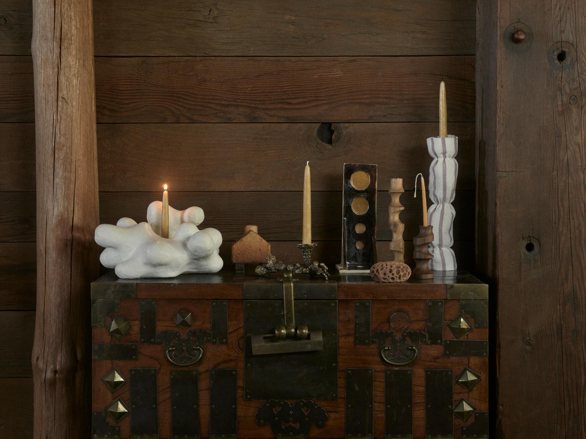 Installation view of "100 Candleholders" by Nathan Lynch, George Sherman, Lisa Eisner, Christopher Robin Duncan, Jay Nelson, Tiago Almeida, and Marina Contro