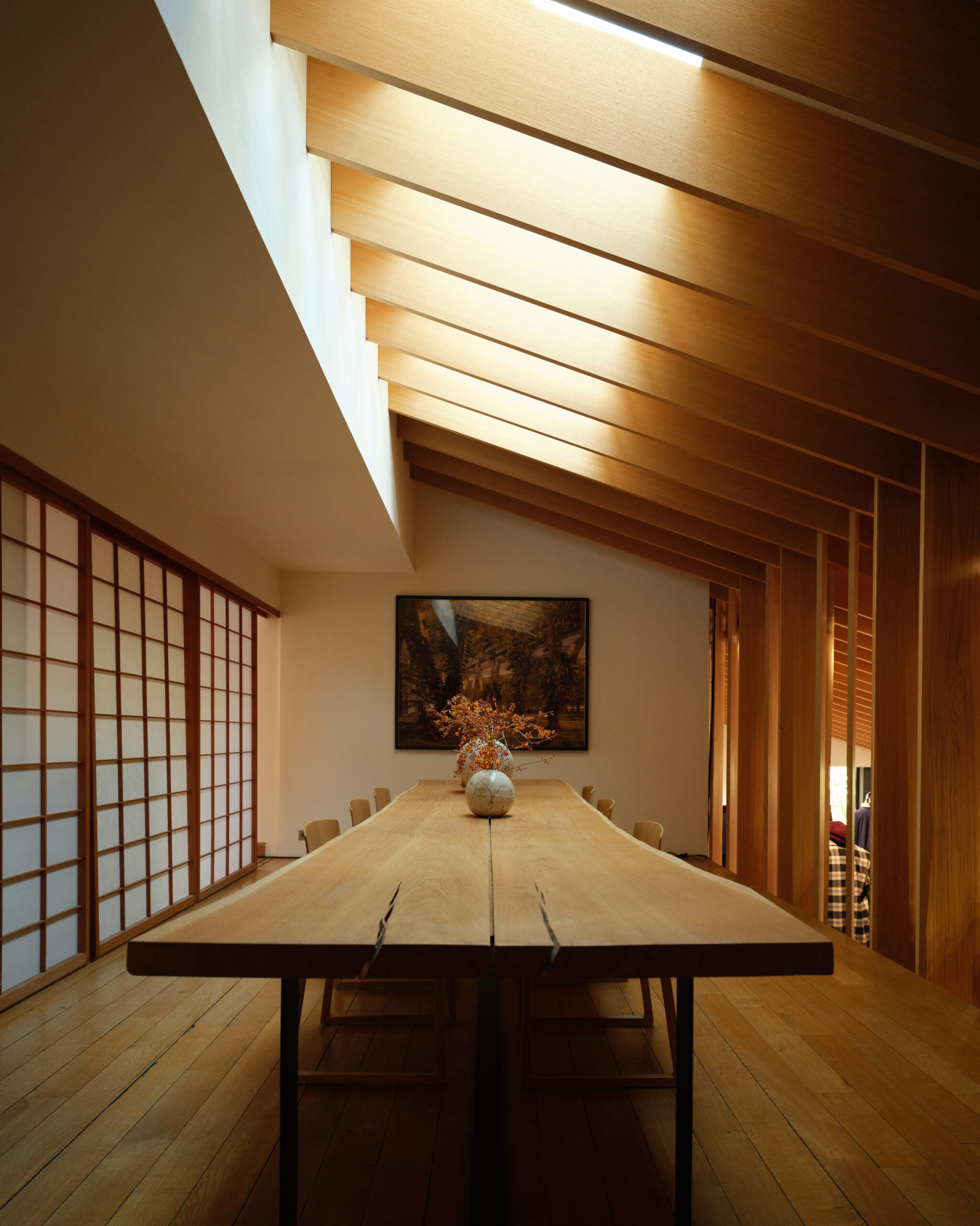 A light filled room of French oak in the Kenzo Takada designed Paris home.