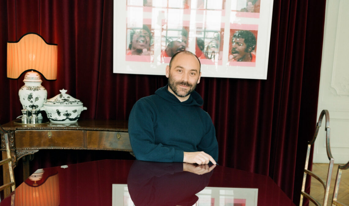 Nicholas Aburn, creative director of fashion label Area, at home in Paris with artwork by Jay Ramier