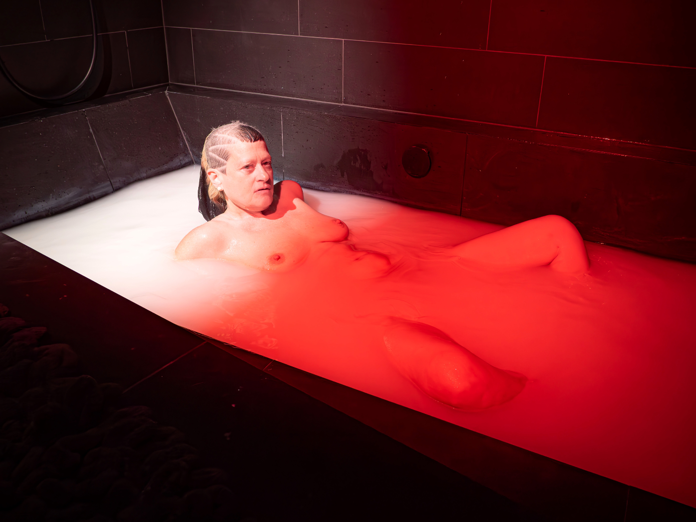 Peaches nude in the bath to promote her new album No Lube So Rude.