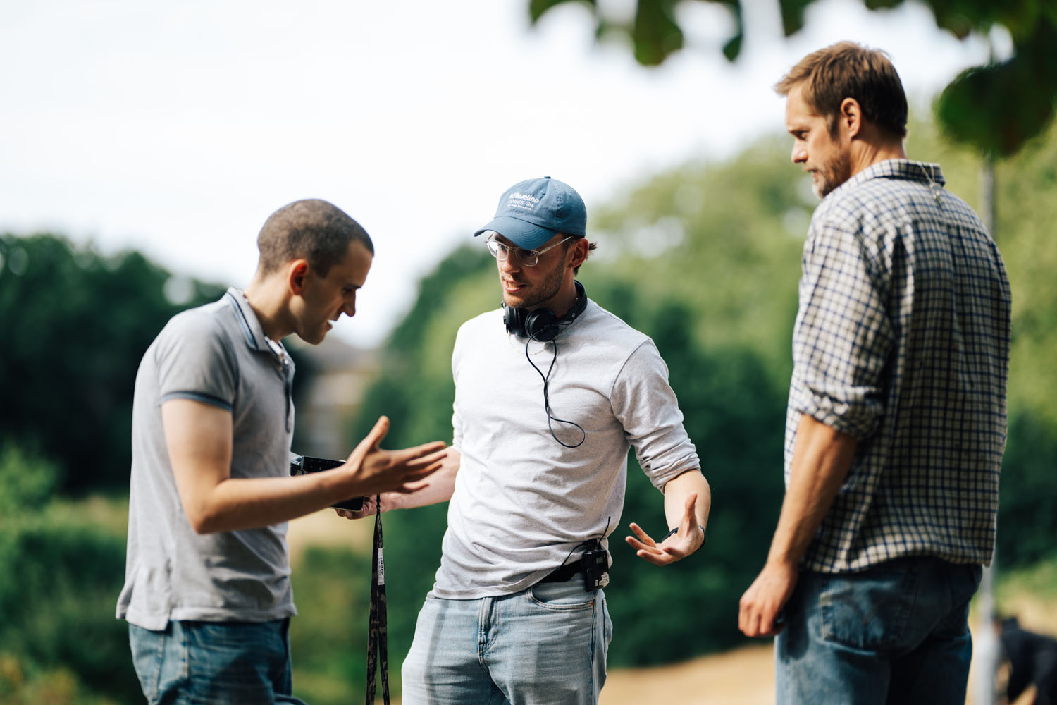 Harry Melling, Harry Lighton, and Alexander Skarsgård on the set of Pillion.