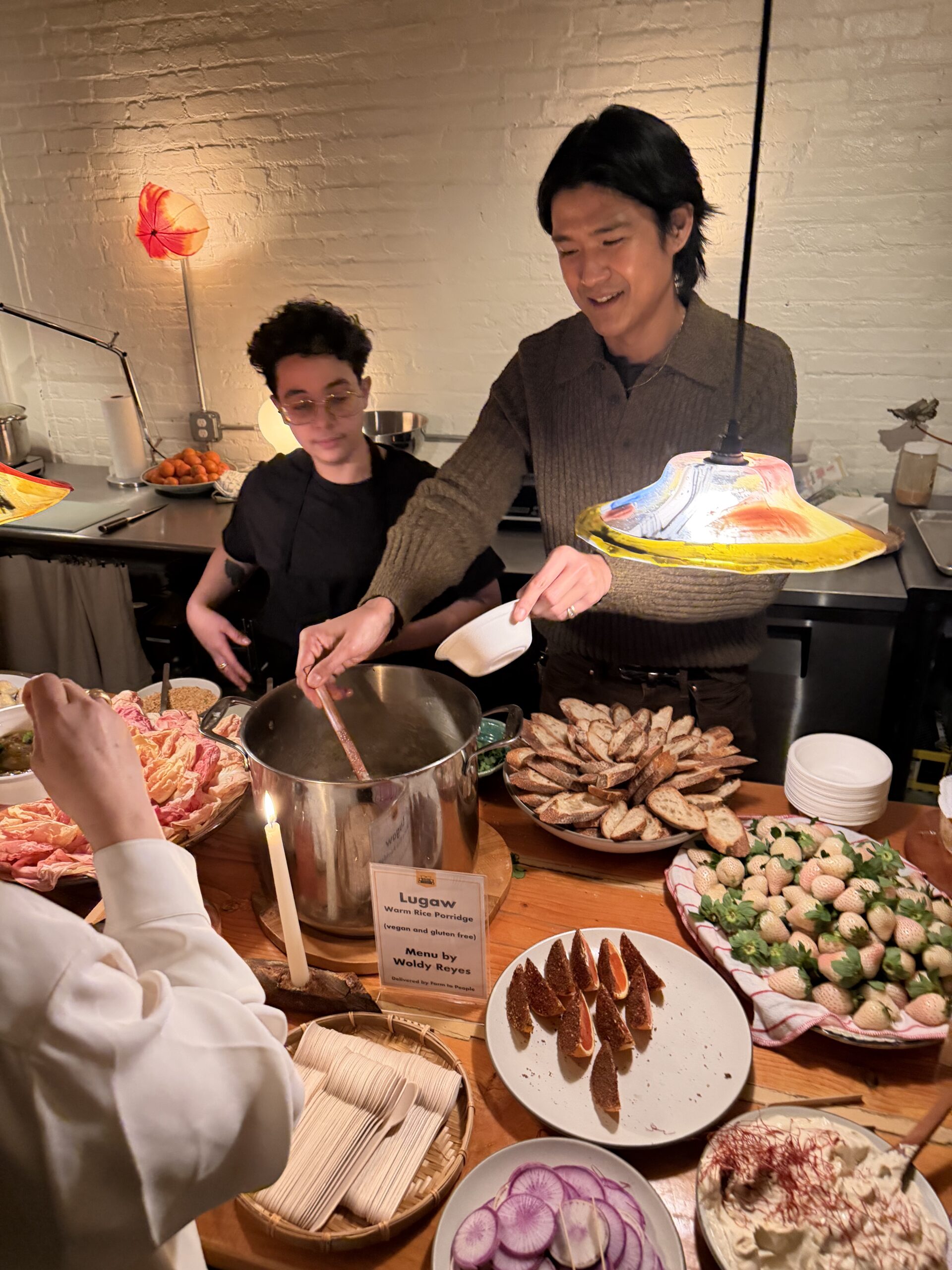 Chef Woldy Reyes serves food at his dinner event at TIWA Select.