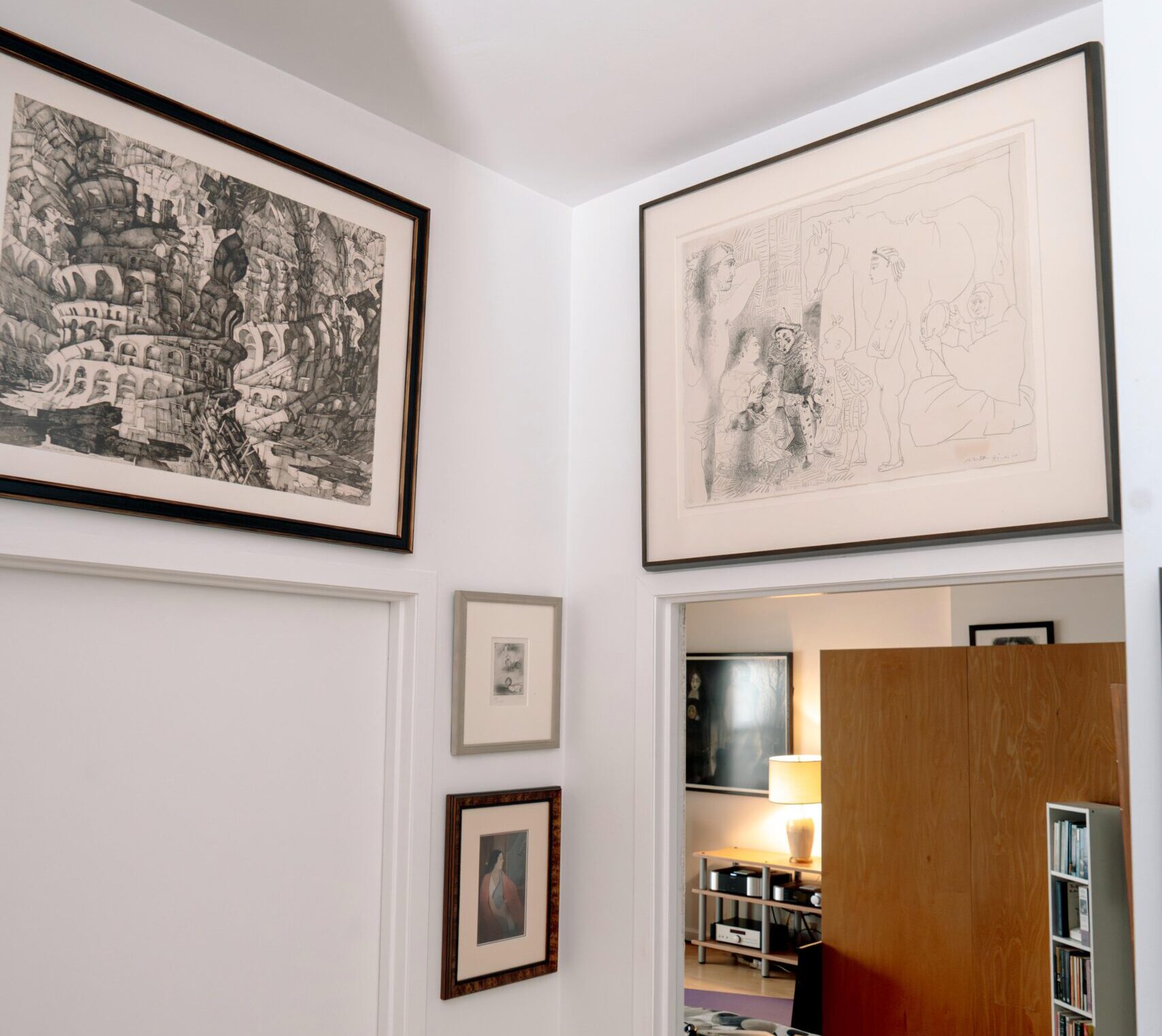 A selection of works from Debraj Ray’s collection, including Erik Desmazières’ La Tour de Babel, Pablo Picasso’s La Famille du Saltimbanques, Joan Miró’s Untitled from Paul Éluard’s Solidarité, and Abanindranath Tagore’s Woman in Profile