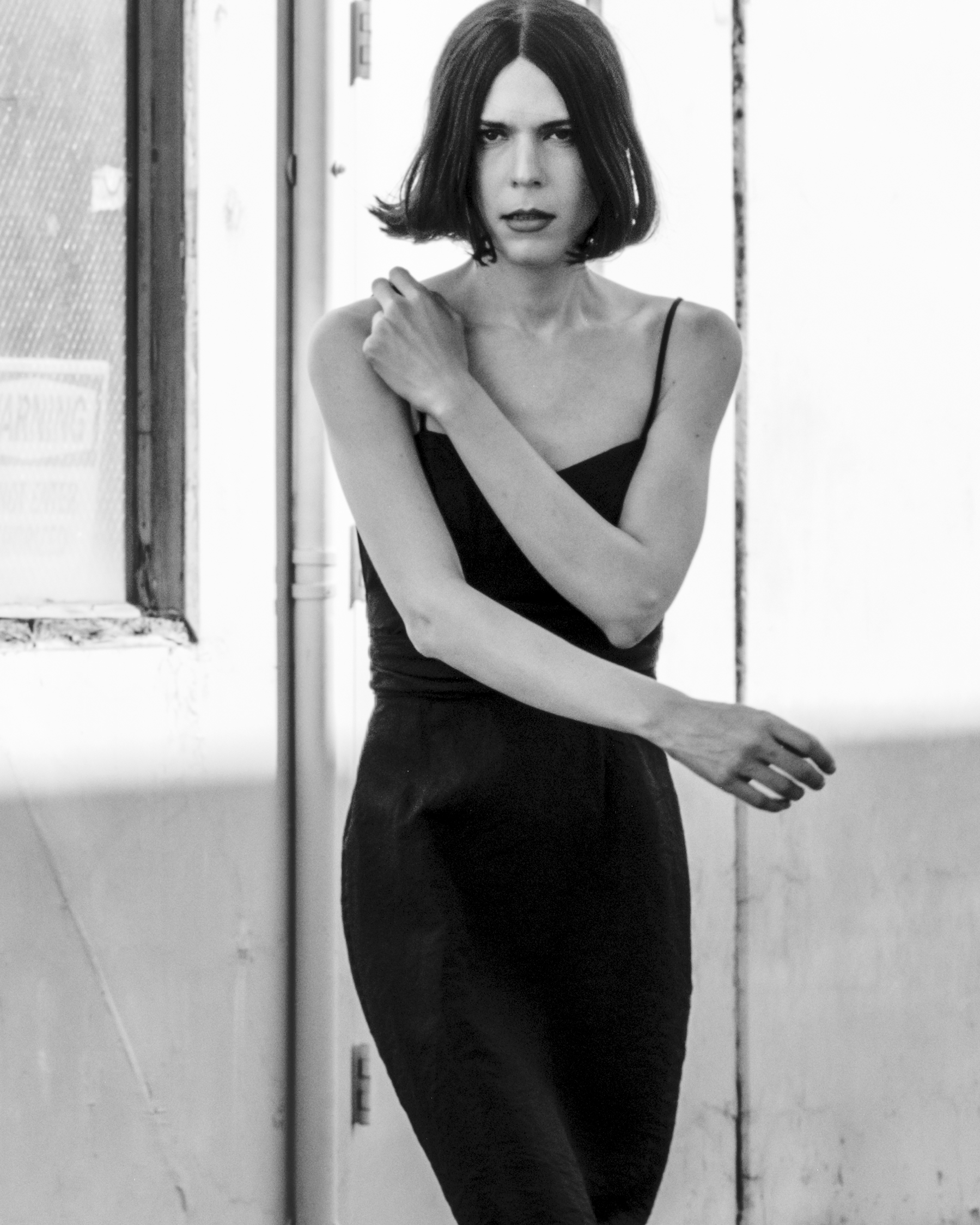 Photographer Cruz Valdez in a vintage little black dress