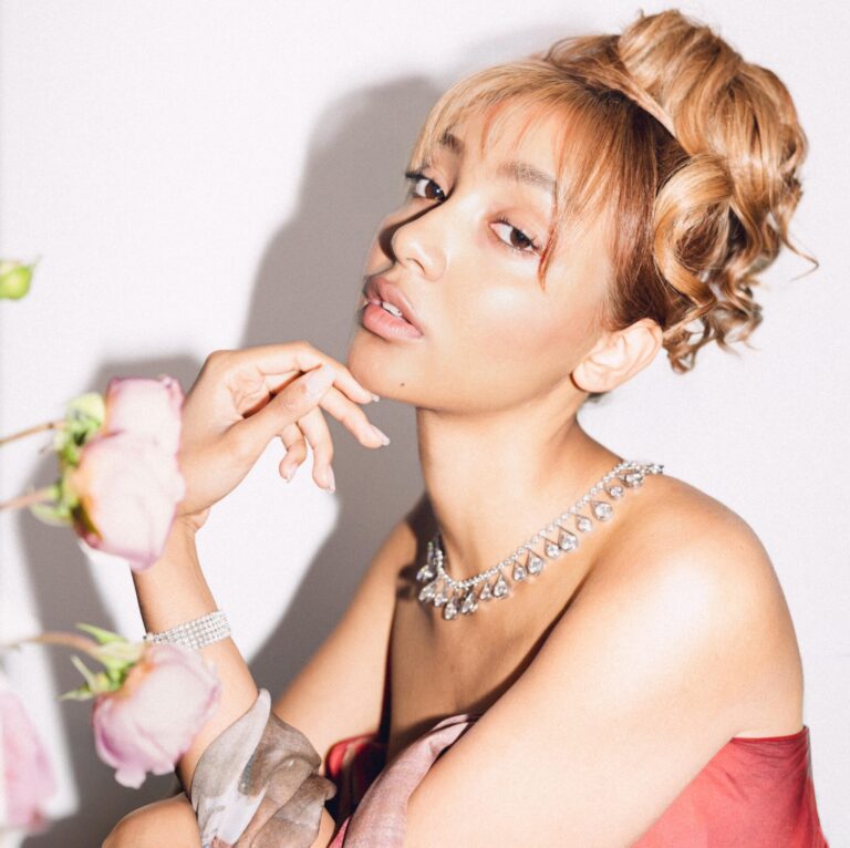 PinkPantheress in preparation for the Grammys in archival Vivienne Westood and Pandora jewelry, shot by Kobe Wagstaff