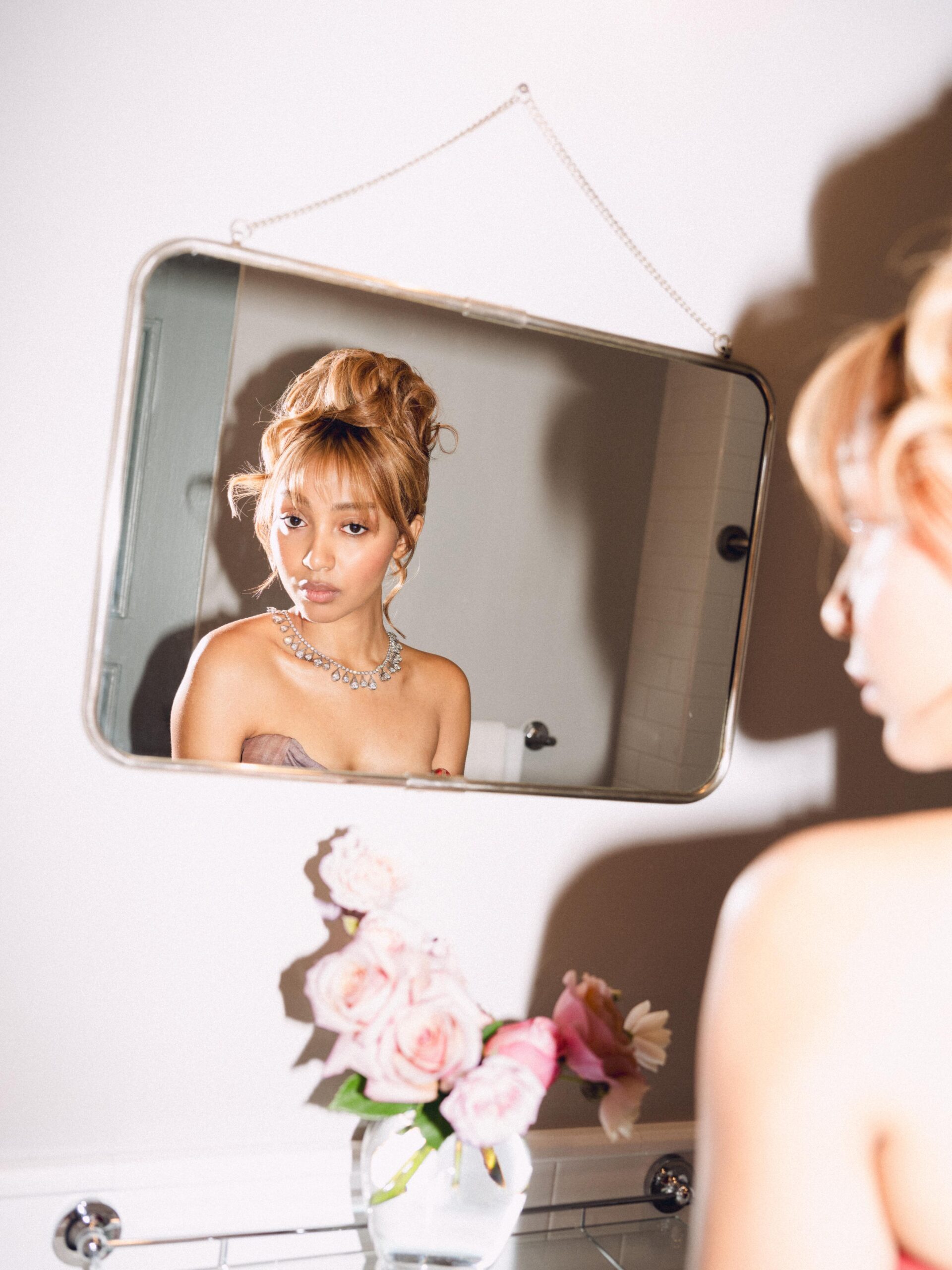 PinkPantheress in preparation for the Grammys in archival Vivienne Westood and Pandora jewelry, shot by Kobe Wagstaff