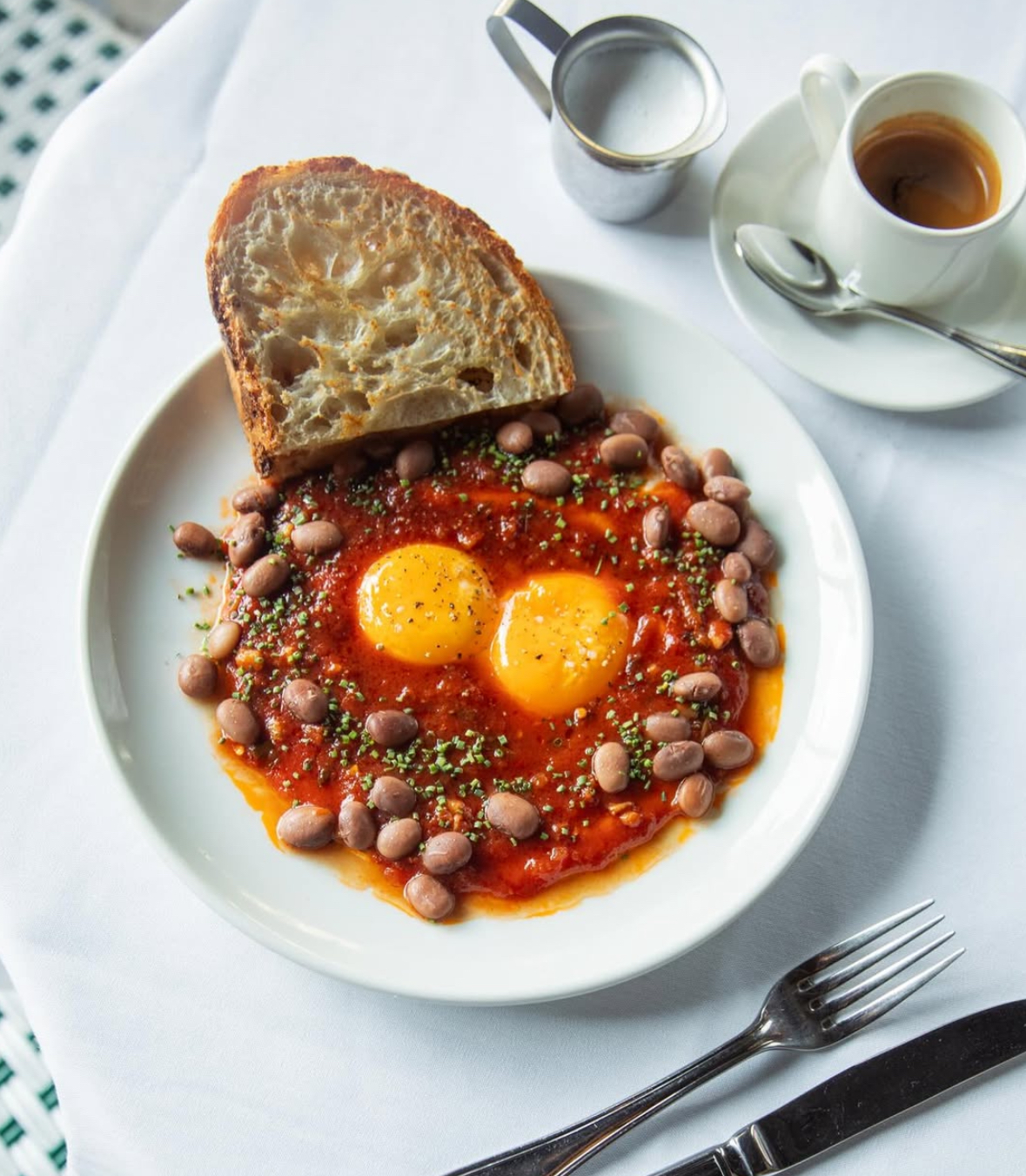 A bowl of eggs and beans at the restaurant Gia in Mexico City