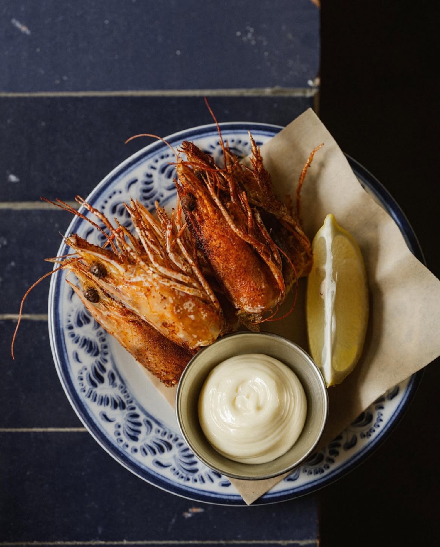 A bowl of shrimp heads with chili powder and aioli at Cana in Mexico City