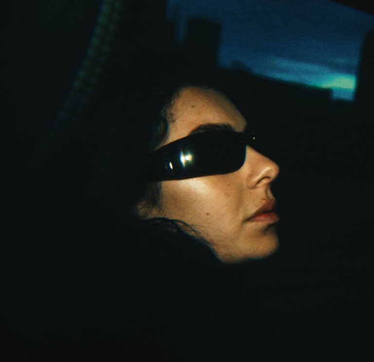 Charli XCX in a still from the movie The Moment.