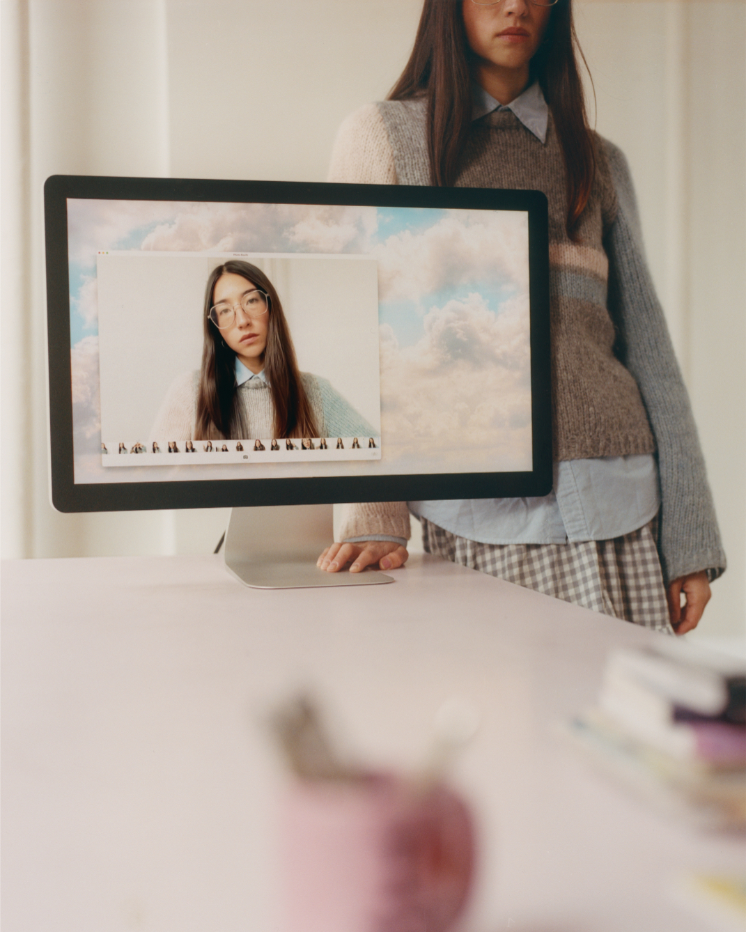 Maya Man Standing Next to a Computer.