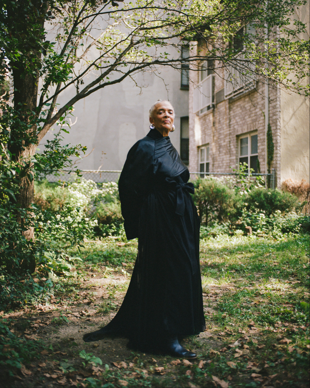 Portrait of Maren Hassinger in a garden