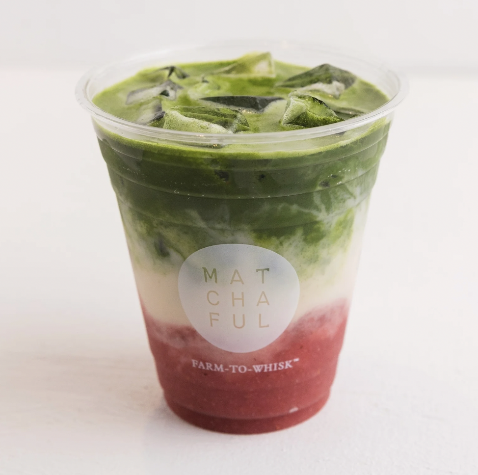 The oishii berry iced matcha at Matchaful, featuring a yellow-white-pink-red gradient in the cup
