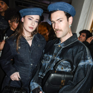 Young Emperors pose for a photo at the Versace SoHo store