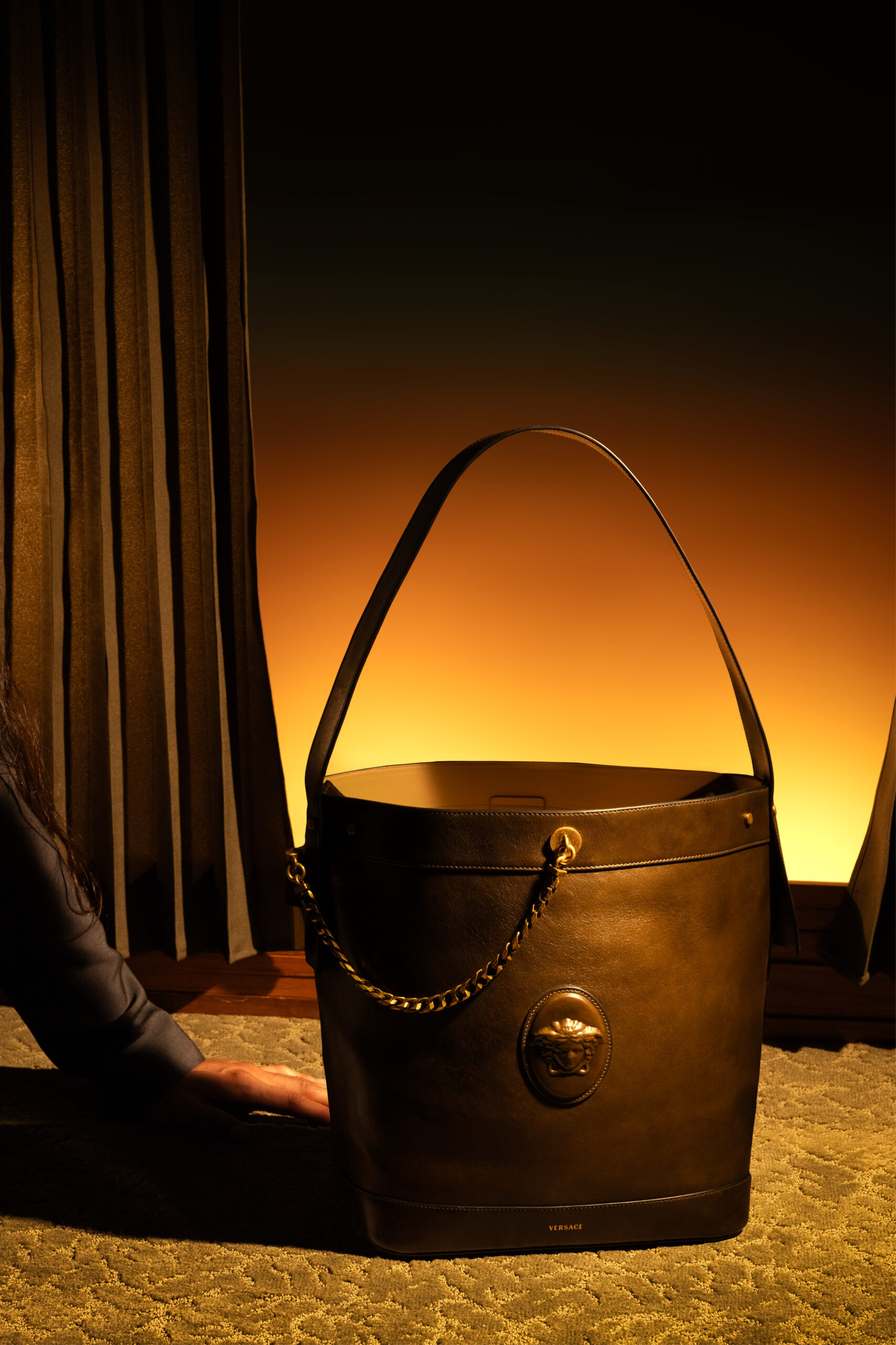 The Versace Pivot bag glows in the new launch campaign