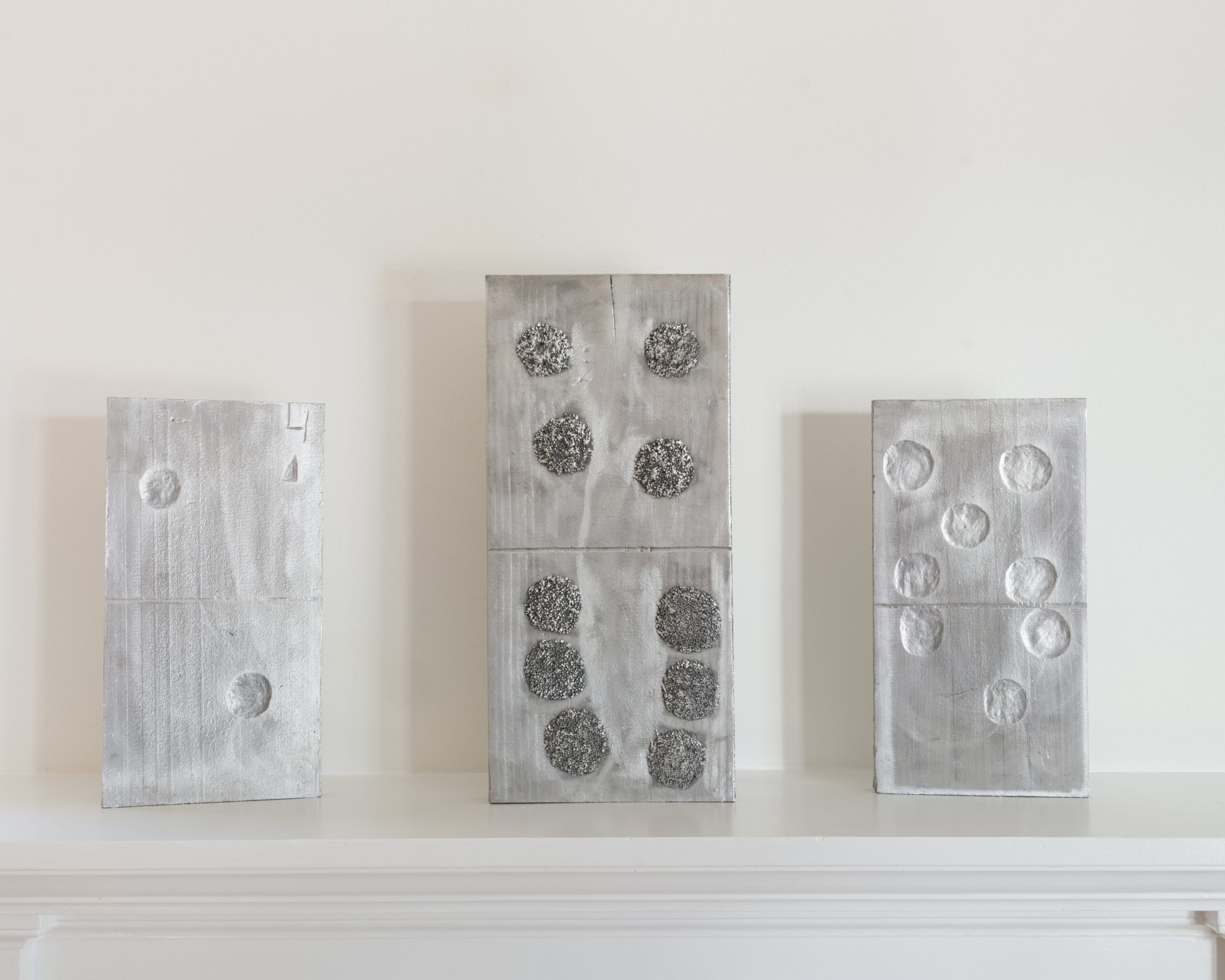 A series of three sculptures by artist Zenobia Lee on display during Frieze LA 2026.