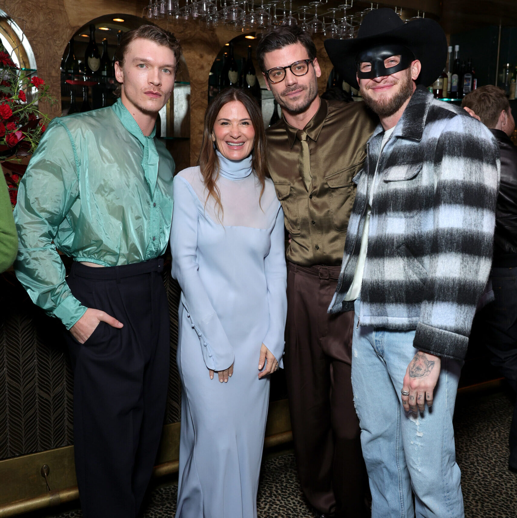 Connor Storrie, Sarah Harrelson, Francois Arnaud, and Orville Peck stand for a portrait at the Connor Storrie cover launch dinner in LA