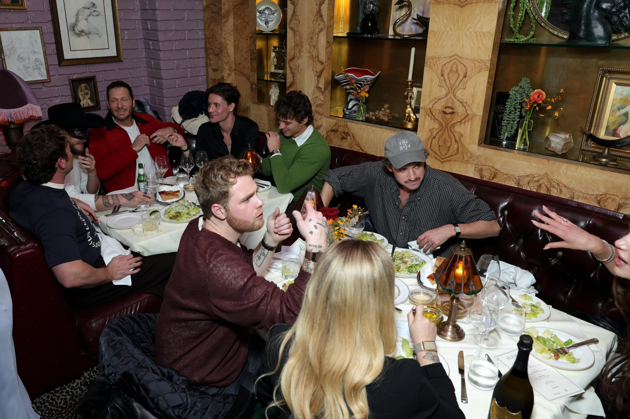 Guests chat at the Connor Storie cover launch dinner